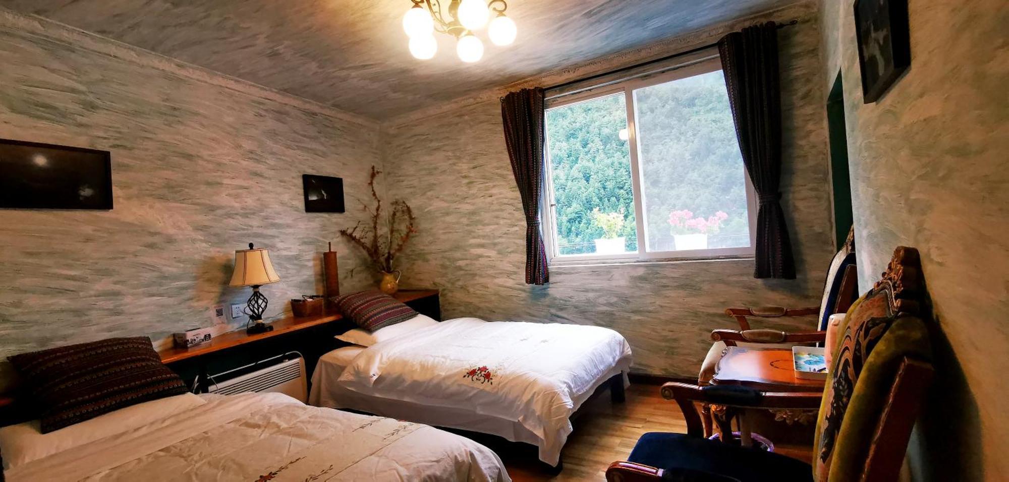 Kangding Guozhuang Nan Wu Hao Boutique Inn Buitenkant foto